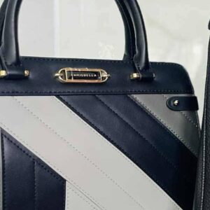 CHRISBELLA diagonal navy gray and white color-blocked satchel with gold hardware